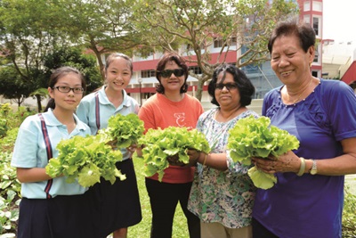 Gardeners with harvest