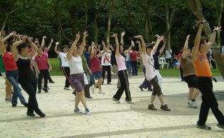 Group dancing at Pill Box event site
