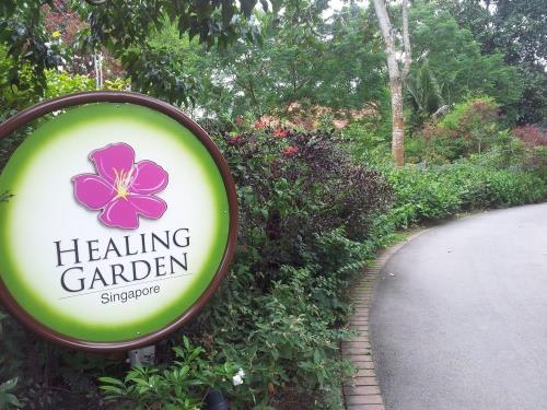 Image of the entrance signage at Healing Garden.