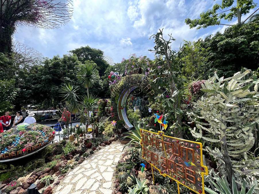 'Quantum Fair 3026' by community gardeners from Singapore's West District, a garden display offering a glimpse into carnivals of the future