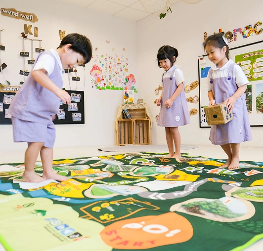 Children playing board game about urban wildlife