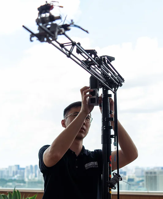Researcher setting up ERNEST drone system